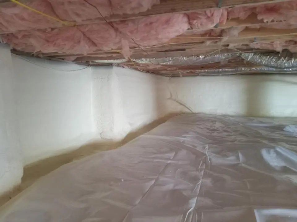 Crawl space encapsulation with closed-cell spray foam for Commercial Roof Restoration in Fort Stewart